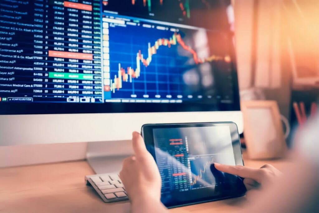 Man with a phone checking funds performance