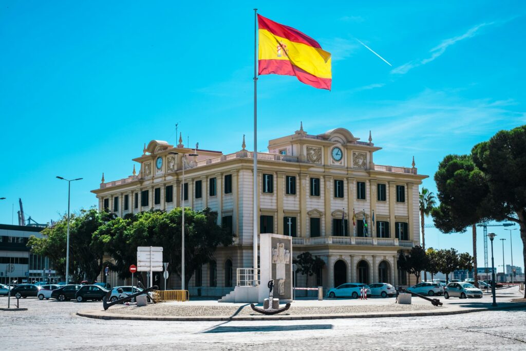 building in spain with spanish flag