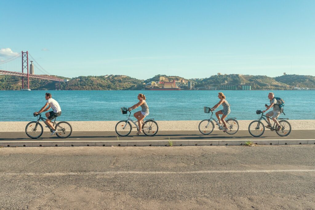 cycling in Lisbon by the river